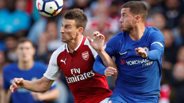 Arsenal's Laurent Koscielny in action with Chelsea's Eden Hazard during their Premier League clash. (Action Images via Reuters) Arsenal's Laurent Koscielny in action with Chelsea's Eden Hazard during their Premier League clash. (Action Images via Reuters)