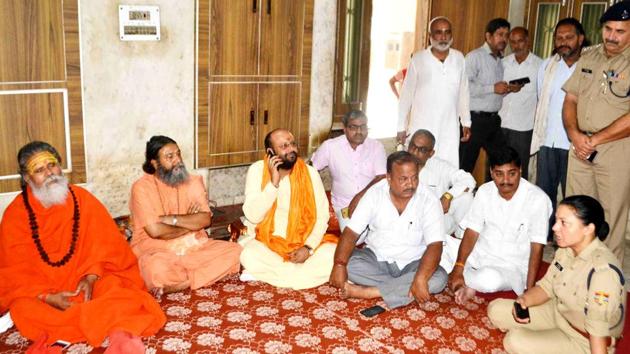 Superintendent of city police Mamta Vohra interact with saints at Udasin Akhada in Haridwar on Sunday.(RAMESHWAR GAUR/HT PHOTO)