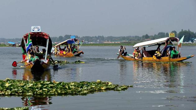 Participants take part in the shikara race during the Expedition India Adventure at Dal Lake in Srinagar on Wednesday. (PTI) Participants take part in the shikara race during the Expedition India Adventure at Dal Lake in Srinagar on Wednesday. (PTI)