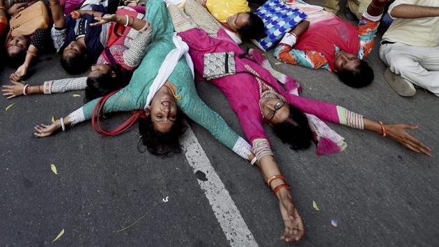 'Shiksha Mitras' from UP shout slogans during a protest against Uttar Pradesh Chief Minister Yogi Adityanath for their various demands at Parliament Street in New Delhi on Thursday. (PTI) 'Shiksha Mitras' from UP shout slogans during a protest against Uttar Pradesh Chief Minister Yogi Adityanath for their various demands at Parliament Street in New Delhi on Thursday. (PTI)
