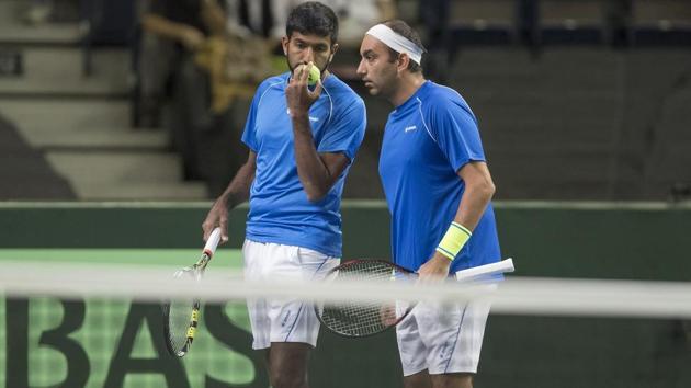 Rohan Bopanna and Purav Raja of India in action during their Davis Cup match against Daniel Nestor and Vasek Pospisil of Canada at Northlands Coliseum.(USA Today Sports) Rohan Bopanna and Purav Raja of India in action during their Davis Cup match against Daniel Nestor and Vasek Pospisil of Canada at Northlands Coliseum.(USA Today Sports)