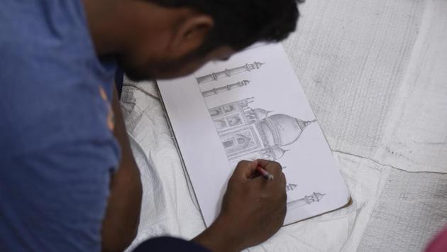 The idea behind the art school, says Rajesh Chauhan, superintendent of jail number 4 is to help inmates use their time constructively. ‘Those who have joined art school are no more angry, no longer pick fights. Painting has a cathartic effect on them’, he said. (Vipin Kumar / HT Photo) 