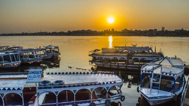A picture taken on September 10, 2017 shows river boats moored in the Nile at a marina at sunrise in the southern Egyptian city of Luxor. (Khaled Desouki / AFP) A picture taken on September 10, 2017 shows river boats moored in the Nile at a marina at sunrise in the southern Egyptian city of Luxor. (Khaled Desouki / AFP)
