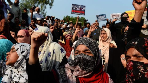 Indian demonstrators shout slogans during a protest against the treatment of Rohingya Muslims in Myanmar, as they try to march towards Myanmar embassy in New Delhi on September 13, 2017. A crackdown by Myanmar's army launched in response to Rohingya militant attacks on August 25 has sent some 379,000 Rohingya refugees scrambling across the border to Bangladesh in less than three weeks. (Sajjad Hussain / AFP) Indian demonstrators shout slogans during a protest against the treatment of Rohingya Muslims in Myanmar, as they try to march towards Myanmar embassy in New Delhi on September 13, 2017. A crackdown by Myanmar's army launched in response to Rohingya militant attacks on August 25 has sent some 379,000 Rohingya refugees scrambling across the border to Bangladesh in less than three weeks. (Sajjad Hussain / AFP)