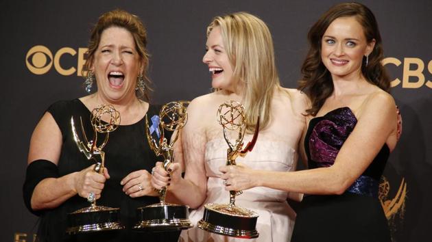 Ann Dowd (L) poses with the Emmy for Outstanding Supporting Actress in a Drama Series, Elisabeth Moss with the Emmy for Outstanding Lead Actress in a Drama Series and Alexis Bledel with the Emmy for Outstanding Guest Actress in a Drama, all awards for the The Handmaid's Tale. (REUTERS) Ann Dowd (L) poses with the Emmy for Outstanding Supporting Actress in a Drama Series, Elisabeth Moss with the Emmy for Outstanding Lead Actress in a Drama Series and Alexis Bledel with the Emmy for Outstanding Guest Actress in a Drama, all awards for the The Handmaid's Tale. (REUTERS)
