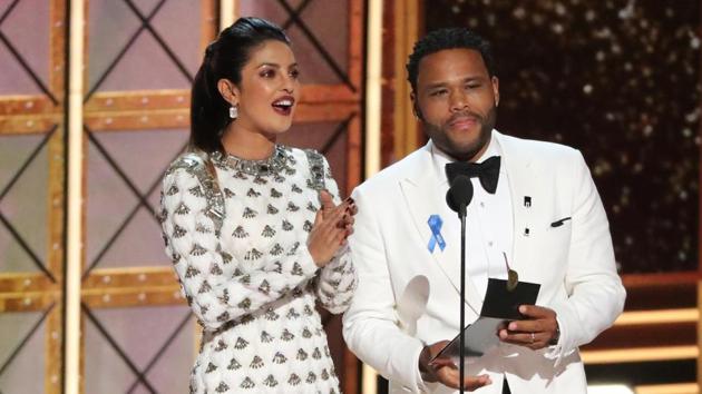 Anthony Anderson and Priyanka Chopra present the award for Outstanding Variety Talk Series.(REUTERS)