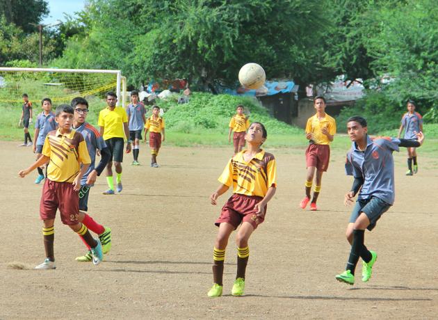 St Vincent’s High School (yellow) and Delhi Public School (grey) in action at the inter-school football tournament organised by the District Sports Council and Education Board on Monday. (HT photo) St Vincent’s High School (yellow) and Delhi Public School (grey) in action at the inter-school football tournament organised by the District Sports Council and Education Board on Monday. (HT photo)