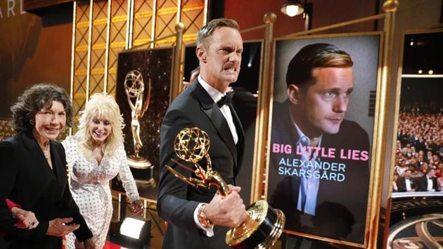 Alexander Skarsgard, winner of the award for outstanding supporting actor in a limited series or a movie for Big Little Lies walks off the red carpet stage. (Invision for the Television Academy) Alexander Skarsgard, winner of the award for outstanding supporting actor in a limited series or a movie for Big Little Lies walks off the red carpet stage. (Invision for the Television Academy)
