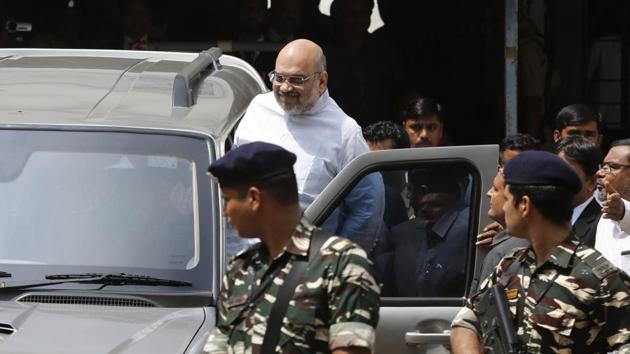Bharatiya Janata Party president Amit Shah leaves after appearing before a special sessions court in Ahmedabad on Monday.(AP Photo)