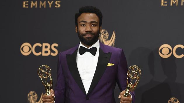 Donald Glover poses in the press room with his awards for outstanding lead actor in a comedy series and for outstanding directing for a comedy series for Atlanta. (Jordan Strauss/Invision/AP) Donald Glover poses in the press room with his awards for outstanding lead actor in a comedy series and for outstanding directing for a comedy series for Atlanta. (Jordan Strauss/Invision/AP)
