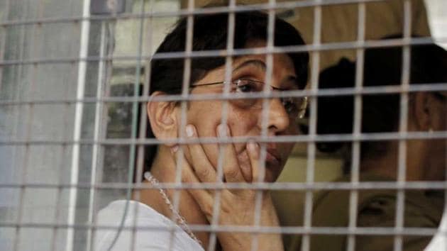 A file photo of former Gujarat minister and BJP leader Maya Kodnani arriving at a special court in Ahmedabad.(AP)