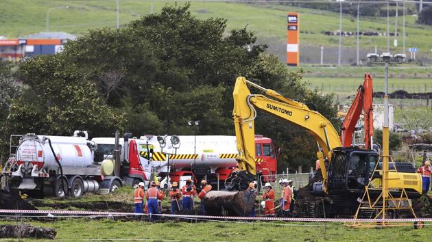 New Zealand Refinery staff work at the site of a jet fuel pipeline leak on a farm near Ruakaka in the North Island of New Zealand. (AP Photo) New Zealand Refinery staff work at the site of a jet fuel pipeline leak on a farm near Ruakaka in the North Island of New Zealand. (AP Photo)
