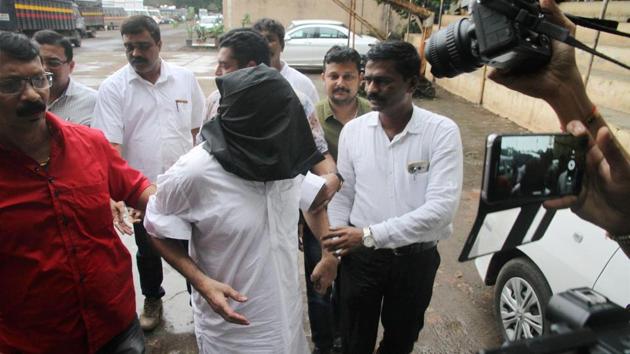 Underworld don Dawood Ibrahim's brother Iqbal Kaskar being produced in a court in Thane, Mumbai on Tuesday.(PTI)