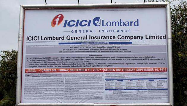 A pigeon flies over a billboard of Indian insurer ICICI Lombard in Mumbai, India, September 19, 2017. (REUTERS) A pigeon flies over a billboard of Indian insurer ICICI Lombard in Mumbai, India, September 19, 2017. (REUTERS)