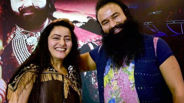Honeypreet Insan with Gurmeet Ram Rahim Singh. (PTI File Photo) Honeypreet Insan with Gurmeet Ram Rahim Singh. (PTI File Photo)