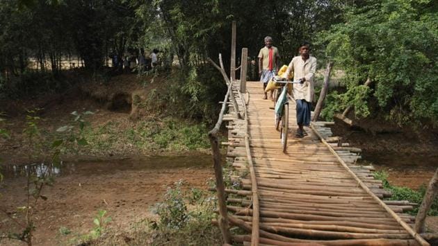 Here is a bamboo bridge made by the villagers which connects the Nakeagunj to Bhargora block to West Bengal’s Balia (West Midnapur). The bridge saves an otherwise 20kms of travel between the villages. (Parwaz Khan / HT Photo) Here is a bamboo bridge made by the villagers which connects the Nakeagunj to Bhargora block to West Bengal’s Balia (West Midnapur). The bridge saves an otherwise 20kms of travel between the villages. (Parwaz Khan / HT Photo)