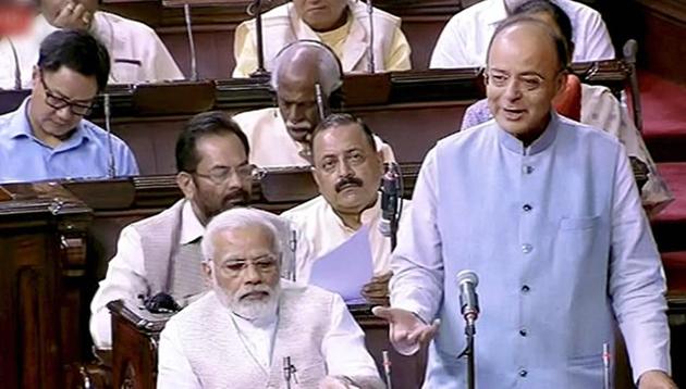 Finance minister Arun Jaitley speaks in the Rajya Sabha in New Delhi. Prime Minister Narendra Modi is also seen.(PTI File Photo / TV GRAB)