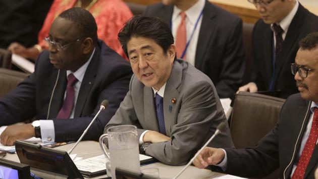 Japanese Prime Minister Shinzo Abe speaks at a meeting about universal health care during the United Nations General Assembly at UN headquarters, September 18, 2017. Under director general, Tedros Adhanom Ghebreyesus, the World Health Organization will try to bring health issues to attention. Universal health coverage is one of the UN’s 17 sustainable development goals for countries to aim for by 2030. (Seth Wenig / AP) Japanese Prime Minister Shinzo Abe speaks at a meeting about universal health care during the United Nations General Assembly at UN headquarters, September 18, 2017. Under director general, Tedros Adhanom Ghebreyesus, the World Health Organization will try to bring health issues to attention. Universal health coverage is one of the UN’s 17 sustainable development goals for countries to aim for by 2030. (Seth Wenig / AP)
