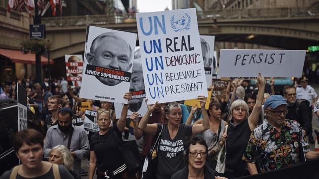 Protestors march during a demonstration against President Donald Trump and his policies. Protestors have gathered inside Grand Central Terminal and took the streets chanting ‘No white supremacists this is our democracy’. US President Donald Trump made his first appearance at the United Nation General Assembly this Monday. (Andres Kudacki / AP) Protestors march during a demonstration against President Donald Trump and his policies. Protestors have gathered inside Grand Central Terminal and took the streets chanting ‘No white supremacists this is our democracy’. US President Donald Trump made his first appearance at the United Nation General Assembly this Monday. (Andres Kudacki / AP)