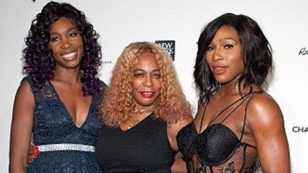 Oracene Price is flanked by her daughters Venus Williams and Serena Williams (extreme right). Oracene was a tennis coach and divorced her husband Richard Williams in 2002.(Getty Images)