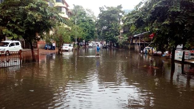 This street in Sion floods whenever it rains, and Wednesday was no different. (kunal patil/hindustan times) This street in Sion floods whenever it rains, and Wednesday was no different. (kunal patil/hindustan times)