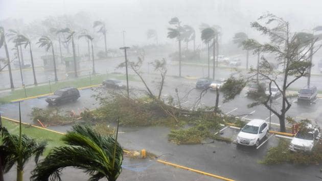 Strong winds and rains lashed Puerto Rico as Hurricane Maria made landfall on Wednesday.(AFP)