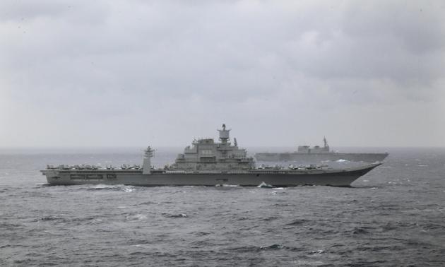 INS Vikramaditya and Japan's helicopter carrier Izumo participate in the Malabar 2017 trilateral exercises between India, Japan and US in the Bay of Bengal on July 17, 2017.(AP)