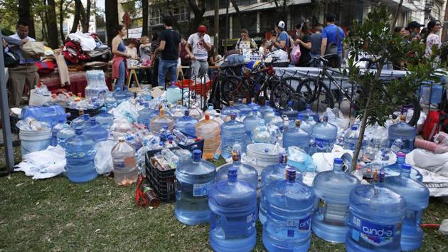 Volunteers gather water, medicine, and blankets donated by neighborhood residents in the Condesa neighborhood of Mexico City. Volunteers have urgently called for more supplies. ‘We need batteries, torches, blankets, another megaphone, more tools, please bring us what we need,’ one man said. (Rebecca Blackwell / AP) Volunteers gather water, medicine, and blankets donated by neighborhood residents in the Condesa neighborhood of Mexico City. Volunteers have urgently called for more supplies. ‘We need batteries, torches, blankets, another megaphone, more tools, please bring us what we need,’ one man said. (Rebecca Blackwell / AP)