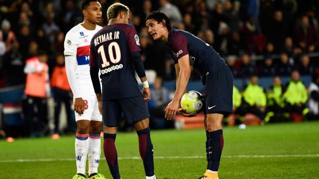 Paris Saint-Germain's Uruguayan forward Edinson Cavani (R) speaks with Brazilian teammate Neymar (C) during the French Ligue 1 football match versus Olympique Lyonnais at the Parc des Princes Stadium in Paris on September 17, 2017. (AFP) Paris Saint-Germain's Uruguayan forward Edinson Cavani (R) speaks with Brazilian teammate Neymar (C) during the French Ligue 1 football match versus Olympique Lyonnais at the Parc des Princes Stadium in Paris on September 17, 2017. (AFP)