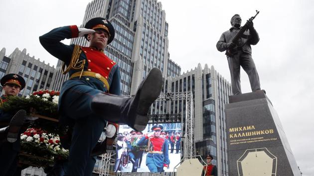 Perched atop a pedestal in a tiny square on Moscow’s busy Garden Ring, Russia on Tuesday unveiled a statue of Mikhail Kalashnikov, inventor of the AK-47 assault rifle that became by some estimates the most lethal weapon ever made and the best known Russian brand abroad. ‘I created a weapon for the defence of my fatherland,’ runs a Kalashnikov quote hewn on the pedestal. At the unveiling ceremony, a Kremlin guard of honour stood to attention as Russia’s national anthem played. (Maxim Zmeyev / AFP) Perched atop a pedestal in a tiny square on Moscow’s busy Garden Ring, Russia on Tuesday unveiled a statue of Mikhail Kalashnikov, inventor of the AK-47 assault rifle that became by some estimates the most lethal weapon ever made and the best known Russian brand abroad. ‘I created a weapon for the defence of my fatherland,’ runs a Kalashnikov quote hewn on the pedestal. At the unveiling ceremony, a Kremlin guard of honour stood to attention as Russia’s national anthem played. (Maxim Zmeyev / AFP)