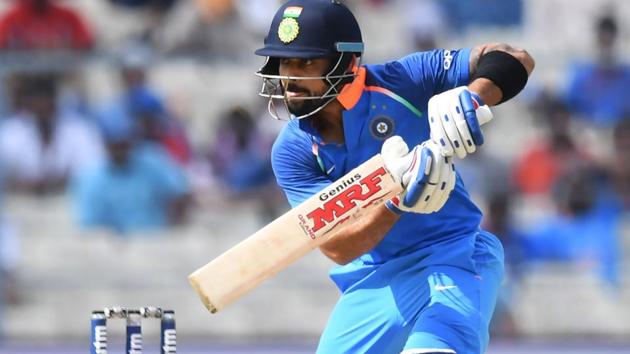 Indian cricket team captain Virat Kohli plays a shot during the second one day international (ODI) against Australia in Kolkata. Get full cricket score and live ball-by-ball updates of Thursday’s India vs Australia, 2nd ODI, here.(AFP)