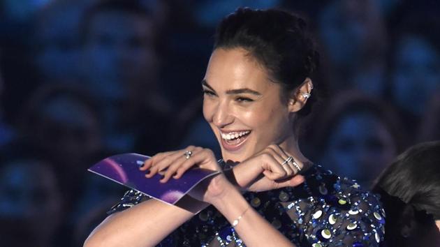 Gal Gadot presents the award for video of the year at the MTV Video Music Awards at The Forum. (Chris Pizzello/Invision/AP) Gal Gadot presents the award for video of the year at the MTV Video Music Awards at The Forum. (Chris Pizzello/Invision/AP)