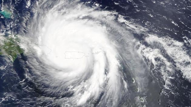Hurricane Maria is pictured engulfing Puerto Rico in the Caribbean Sea in this September 20, 2017 NASA satellite photo. Reaching Puerto Rico ranked a Category 4 storm, with sustained winds of up to 155 miles per hour (250 km per hour), Maria ripped roofs from buildings and turned low-lying roadways into rushing debris-laden rivers cutting across the island. The island’s 3.4 million people faced life-threatening winds for hours, the second time in two weeks in the wake of Hurricane Irma. (NASA / REUTERS) Hurricane Maria is pictured engulfing Puerto Rico in the Caribbean Sea in this September 20, 2017 NASA satellite photo. Reaching Puerto Rico ranked a Category 4 storm, with sustained winds of up to 155 miles per hour (250 km per hour), Maria ripped roofs from buildings and turned low-lying roadways into rushing debris-laden rivers cutting across the island. The island’s 3.4 million people faced life-threatening winds for hours, the second time in two weeks in the wake of Hurricane Irma. (NASA / REUTERS)