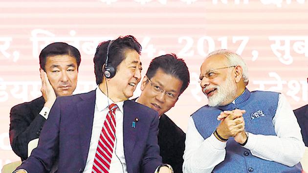 Prime Minister Narendra Modi and Japanese Prime Minister Shinzo Abe interact during a ground breaking ceremony for the Mumbai-Ahmedabad high speed rail project, Ahmedabad, 14(AFP)