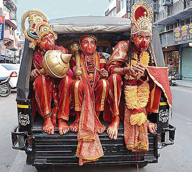 Setting out to fight evil: Devotees dressed as Hanuman commute in Amritsar on October 5, 2011, on the eve of Dussehra. (NARINDER NANU/AFP) Setting out to fight evil: Devotees dressed as Hanuman commute in Amritsar on October 5, 2011, on the eve of Dussehra. (NARINDER NANU/AFP)