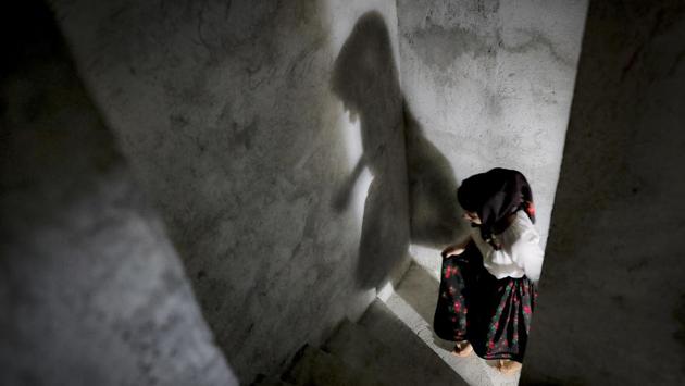 A woman who sings in the choir, wearing a traditional outfit, arrives for the Sunday religious service at the church in the Merry Cemetery. Sculptor, Tincu mused about the philosophy behind the cemetery,‘These texts and images contain elements that remind you of what life is about,’ he said. (Vadim Ghirda / AP) A woman who sings in the choir, wearing a traditional outfit, arrives for the Sunday religious service at the church in the Merry Cemetery. Sculptor, Tincu mused about the philosophy behind the cemetery,‘These texts and images contain elements that remind you of what life is about,’ he said. (Vadim Ghirda / AP)