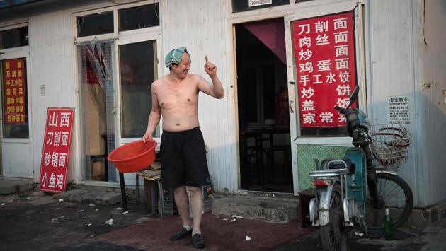 Demolition crews will soon arrive to flatten its alleys packed with dilapidated, one-room dwellings as part of a city-wide ‘clean-up’ campaign. For months, the authorities have bricked up and torn down thousands of shops and homes that are deemed to violate Beijing’s zoning laws as the government seeks to give the capital a facelift and limit the population to 23 million people by 2020. (AFNicolas Asfouri / AFP) Demolition crews will soon arrive to flatten its alleys packed with dilapidated, one-room dwellings as part of a city-wide ‘clean-up’ campaign. For months, the authorities have bricked up and torn down thousands of shops and homes that are deemed to violate Beijing’s zoning laws as the government seeks to give the capital a facelift and limit the population to 23 million people by 2020. (AFNicolas Asfouri / AFP)