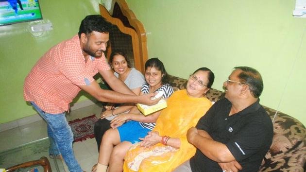 Kuldeep Yadav’s family celebrates the Chinaman bowler’s hat-trick feat against Australia in the second ODI in Kolkata. (Manoj Yadav/HT Photo) 