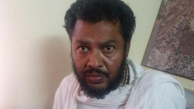 Godman Mohan Govind Das in police custody at Mathura.(HT Photo)