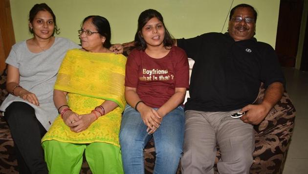 Kuldeep Yadav’s mother Usha Devi (2nd left) quit watching the India-Australia ODI after seeing no success for her son in his initial overs. (Manoj Yadav/HT Photo) 