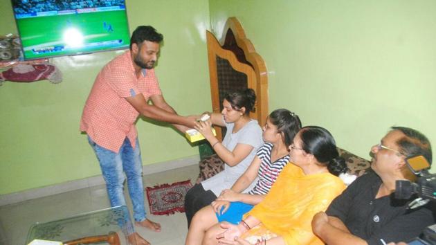 Kuldeep’s mother said his son’s hat-trick was a big gift for her family on Navratras. (Manoj Yadav/HT Photo) 