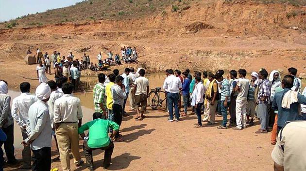 A water-filled mining pit near Khajuraho in Chhatarpur district where two children had drowned earlier this year. (HT Photo) A water-filled mining pit near Khajuraho in Chhatarpur district where two children had drowned earlier this year. (HT Photo)