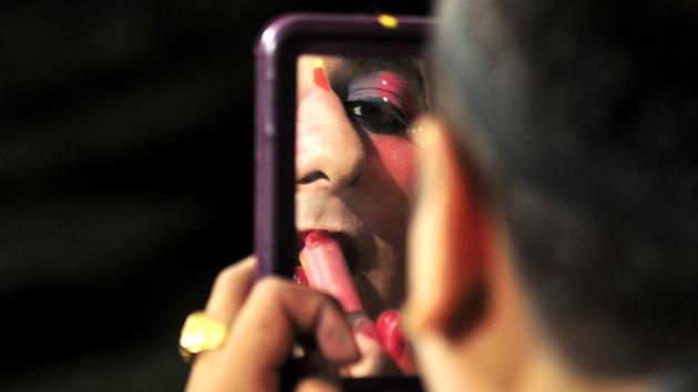 An artiste from Mathura readies for his performance in Chandigarh on Friday. (Ravi Kumar/HT)