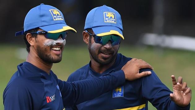 Sri Lankan cricket captain Dinesh Chandimal (L) and Upul Tharanga have signed a petition alongside other cricketers, asking Pramodaya Wickremesinghe to prove his fixing allegations.(AFP)