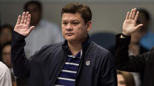 This September 7, 2017 image shows Davao City Vice Mayor Paolo Duterte, son of Philippine President Rodrigo Duterte, taking an oath as he attends a senate hearing in Manila. Philippine President Rodrigo Duterte said Wednesday he has ordered law enforcers to kill his own children, two of whom serve as mayor and vice mayor of his southern home city, if they’re found to be involved in the narcotics trade following allegations of belonging to a drug trafficking ring. (Noel Celis / AFP) This September 7, 2017 image shows Davao City Vice Mayor Paolo Duterte, son of Philippine President Rodrigo Duterte, taking an oath as he attends a senate hearing in Manila. Philippine President Rodrigo Duterte said Wednesday he has ordered law enforcers to kill his own children, two of whom serve as mayor and vice mayor of his southern home city, if they’re found to be involved in the narcotics trade following allegations of belonging to a drug trafficking ring. (Noel Celis / AFP)