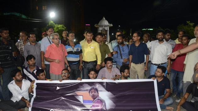 Journalists at a road blockade set up over the killing of journalist Shantanu Bhowmick in Agartala. (AFP) Journalists at a road blockade set up over the killing of journalist Shantanu Bhowmick in Agartala. (AFP)