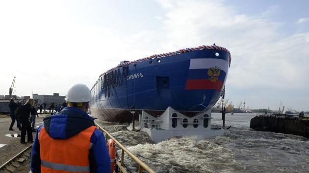 Journalists attend the float out of the Sibir (Siberia) nuclear-powered icebreaker of project 22220, which is scheduled to be completed in 2020, at the Baltic shipyard in Saint Petersburg on Friday.(AFP)