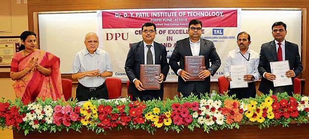 (From left) Prof Urmila Patil; former director of NIT, SS Gokhale; Amit Bhingurde, COO, TAL; Somnath Patil, secretary, Dr DY Patil Vidya Praishthan; Sandeep Dhawkar, GM, Robotic tools and system integration, TAL and Pramod Patil at the event. (HT PHOTO) (From left) Prof Urmila Patil; former director of NIT, SS Gokhale; Amit Bhingurde, COO, TAL; Somnath Patil, secretary, Dr DY Patil Vidya Praishthan; Sandeep Dhawkar, GM, Robotic tools and system integration, TAL and Pramod Patil at the event. (HT PHOTO)