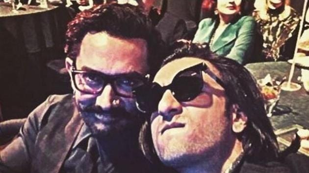 Ranveer Singh with Aamir Khan at the GQ Awards night in Mumbai on Friday.