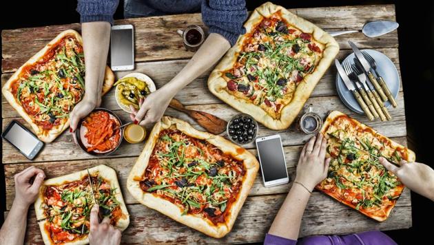 Processed foods such as pizzas are associated with parties or picnics.(Shutterstock) Processed foods such as pizzas are associated with parties or picnics.(Shutterstock)